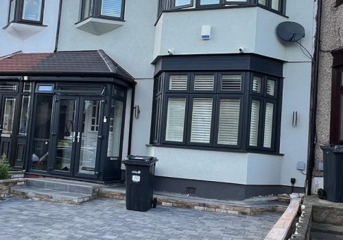 Silicone thin-coat render on a renovated semi-detached home in Greater London.